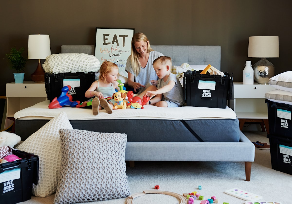 3 children sitting on gray couch related to Score Big with Up-to-Date Bed Bath & Beyond Online Coupons