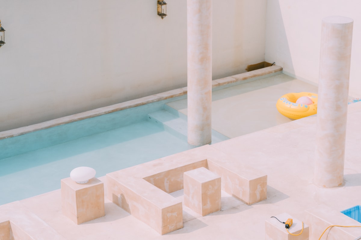 A bath room with a sink and a bath tub related to Building Your Dream Space: A Comprehensive Guide to How to Build a Platform Bed