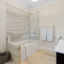 a bathroom with a tub, sink, and mirror related to Elegant Bathroom Shower Curtains with a Touch of Elegance