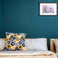 a bed with a pillow and a picture on the wall related to The Ultimate Comfort: Double Room with Two Double Beds