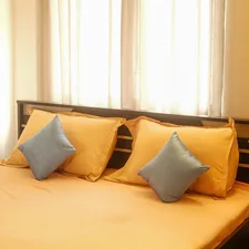 a bed with pillows related to Ultimate Comfort: The Benefits and Buying Guide for a Double Size Bed