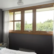 A bedroom with a bed and a window related to Transforming Your Windows with Majestic Victorian Valance Curtains