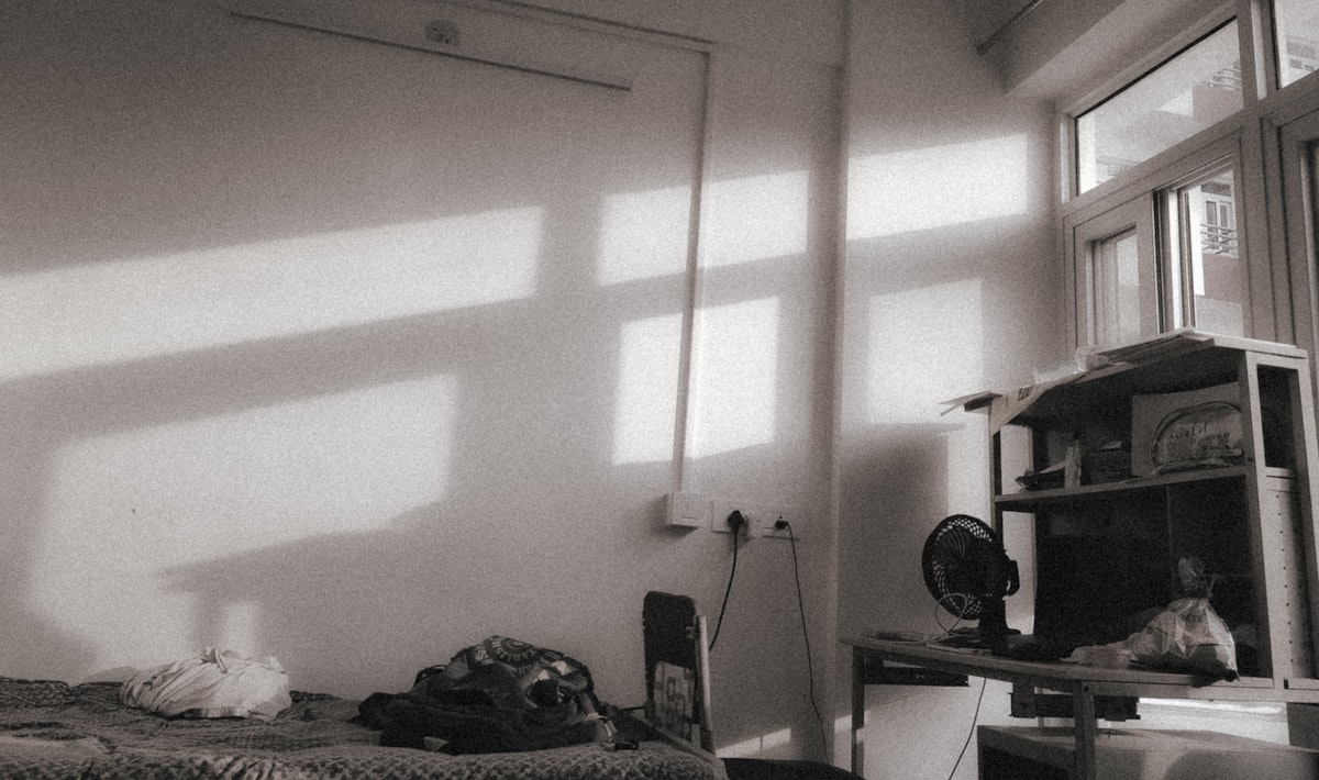 a bedroom with a bed and a window related to Why the Bed Bath and Beyond Fan is a Must-Have for Your Home