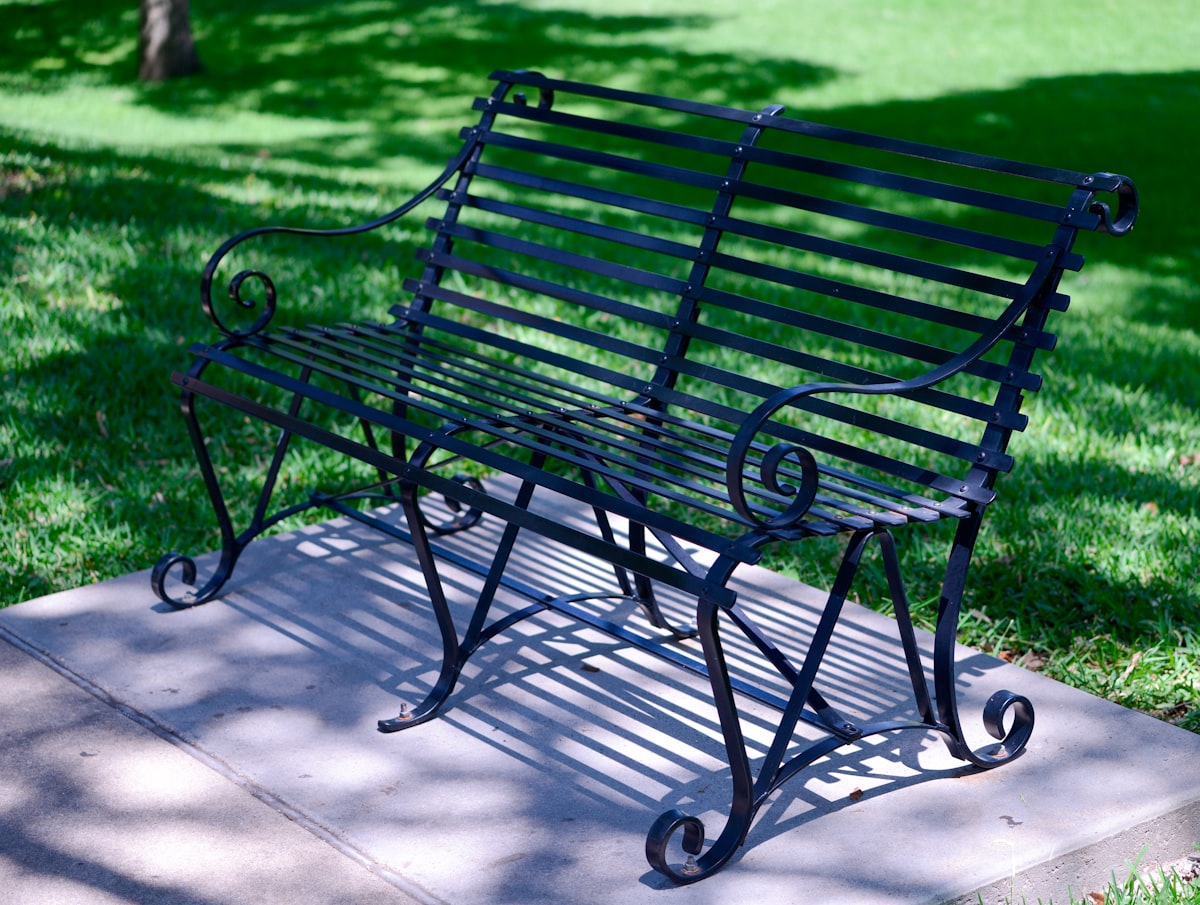 a bench sits unoccupied related to Elevate Your Entryway with Style: The Ultimate Metal Entryway Bench