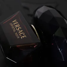 a black cell phone related to Luxurious Comfort: Exploring Versace Bedding Sets
