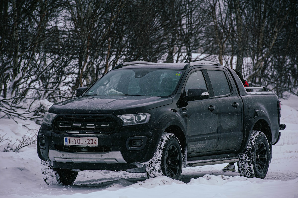 a black truck is parked in the snow related to 2004 Ford Ranger Bumper Valance