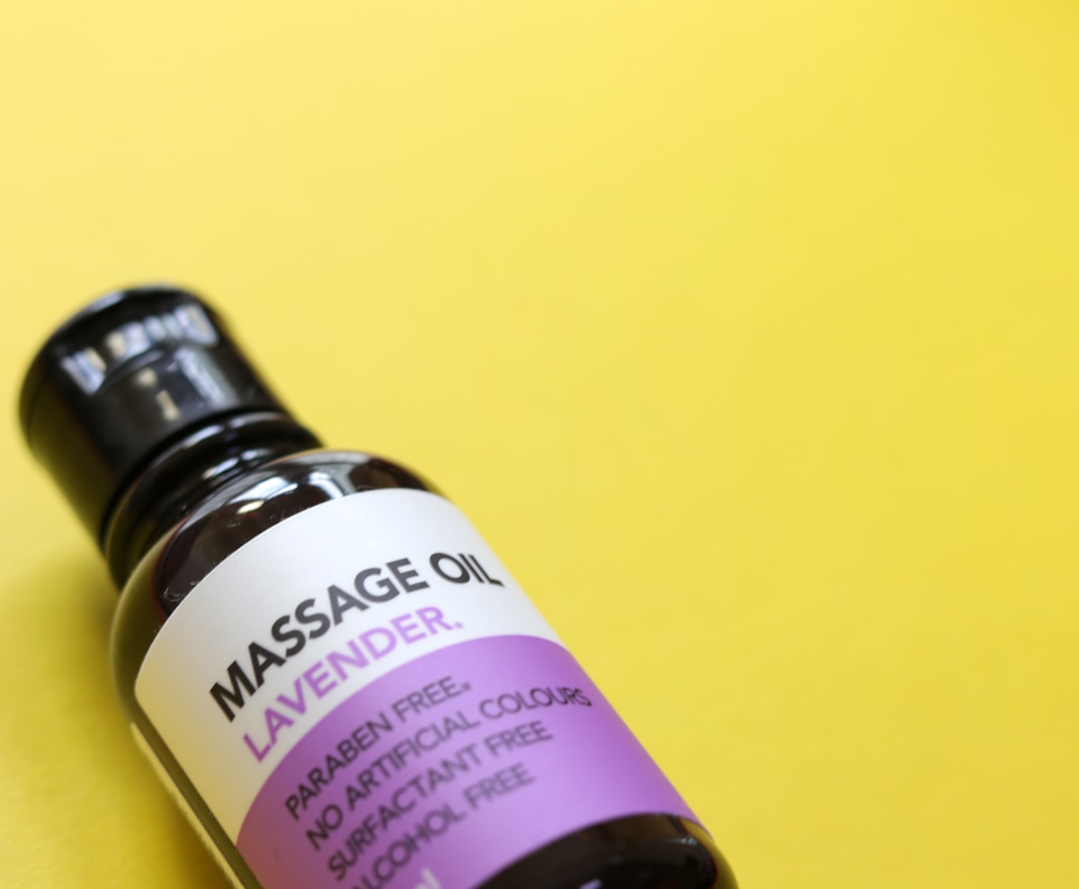 A bottle of Lavender Massage Oil related to How Lavender Oil Can Help Get Rid of Bed Bugs