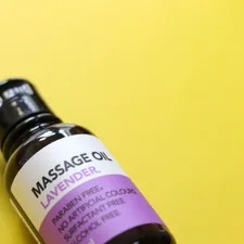 A bottle of Lavender Massage Oil related to How Lavender Oil Can Help Get Rid of Bed Bugs