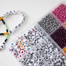 a box filled with lots of different colored beads related to Create Your Own Custom Valance Board