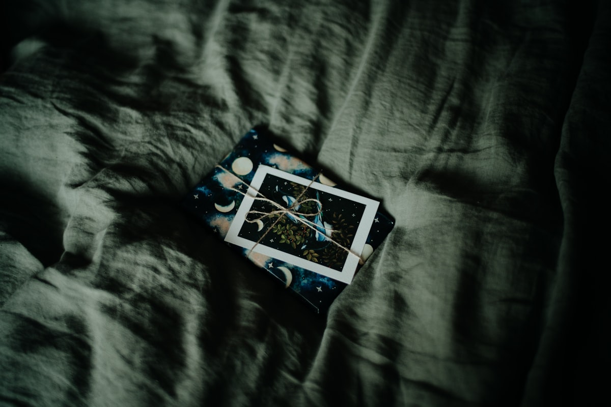 a box with a picture of a bird on it related to Soft and Sumptuous: Elevate Your Bed with a Linen Bed Skirt