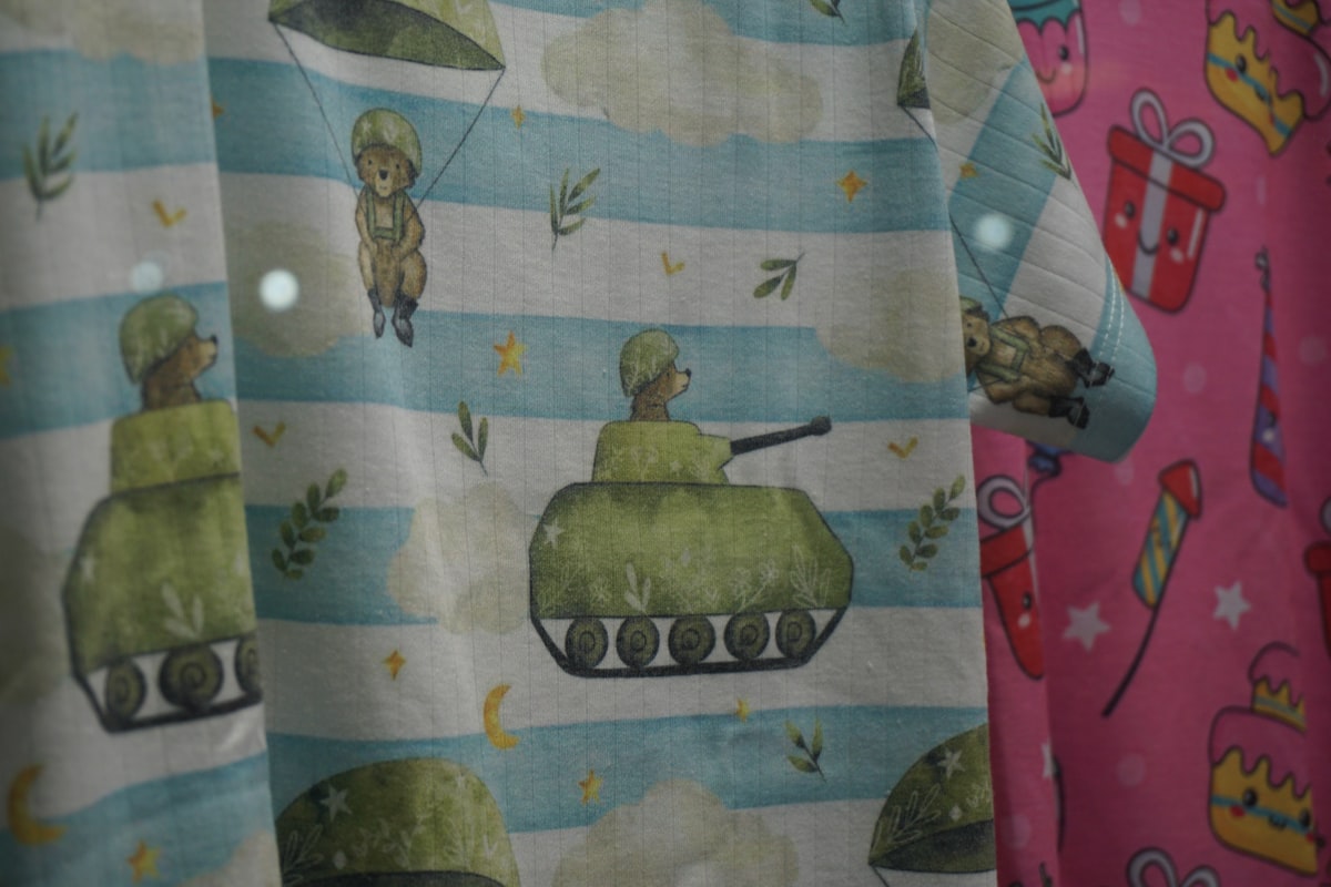 A brave little bear descending from the clouds. related to Choosing the Perfect Camouflage Baby Bedding for Your Nursery