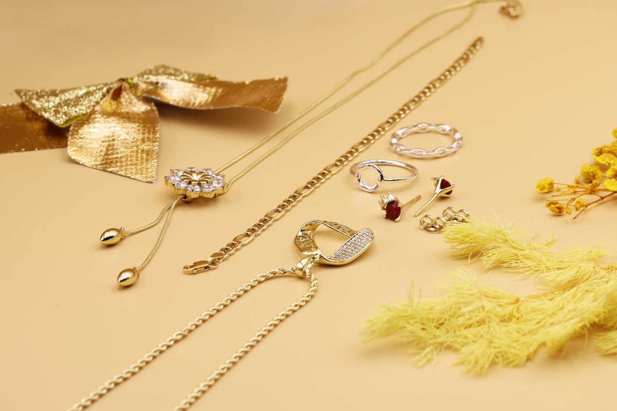 a bunch of jewelry laying on a table related to Maximize Your Space: The Ultimate Guide to Bed Bath and Beyond Jewelry Organizers