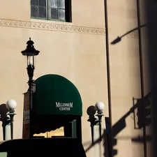 a car is parked in front of a building related to Discover the Charm of Winston Salem: A Bed and Breakfast Getaway