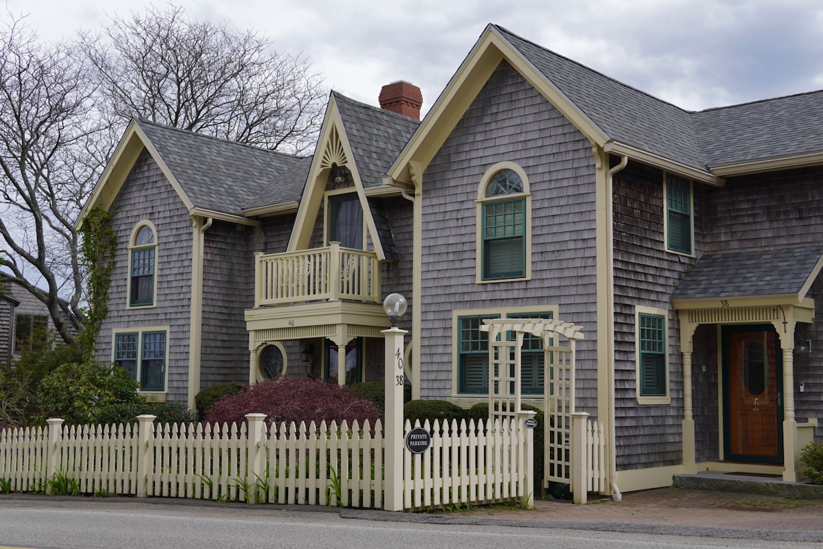 A charming house with a white picket fence. related to Cozy Getaways: Discover the Best Bed and Breakfast in New Orleans