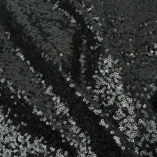 a close up of a black and silver sequin fabric related to Black and Silver Valance
