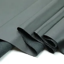 a close up of a black cloth on a white surface related to The Ultimate Guide to Rubber Bed Liners: Protecting Your Truck Bed