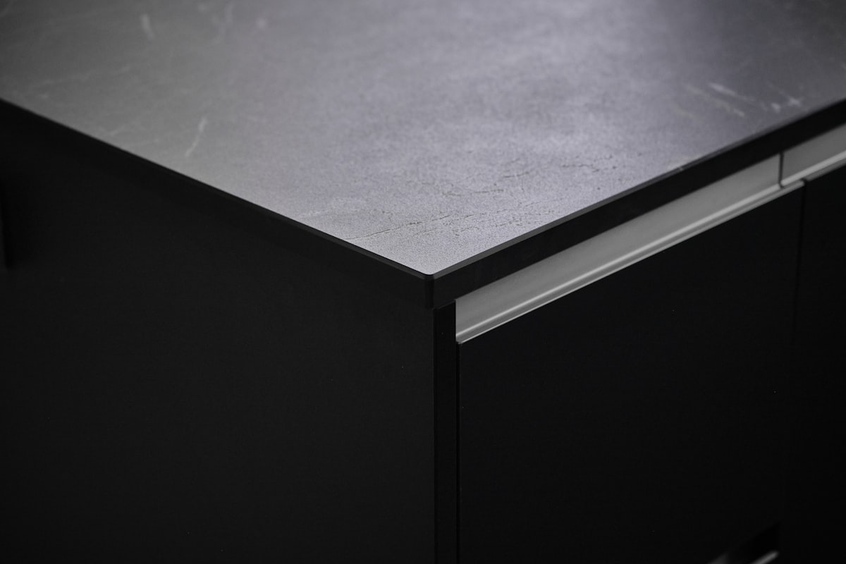 a close up of a black metal cabinet related to The Ultimate Guide to Black Sideboard Cabinets