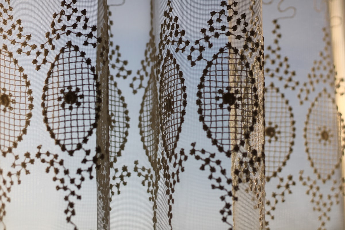 A close up of a curtain with a design on it related to McCall's Valances: Create Custom Window Treatments