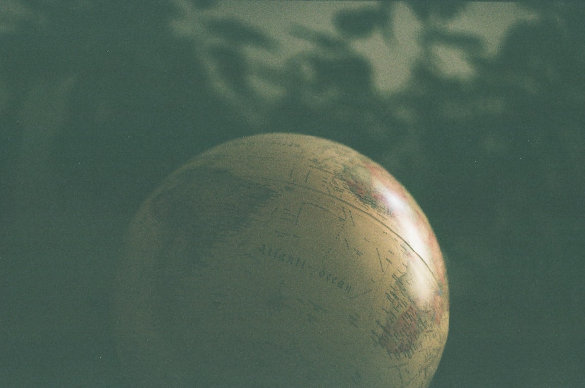 a close up of a globe with trees in the background related to A World of Softness: Exploring the Bliss of Belks Bedding Quilts