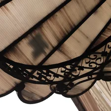 a close up of a light fixture on a building related to Elegant Curved Valance Rods for Your Window Treatments
