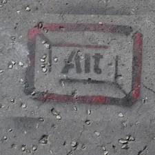 a close up of a street sign on the ground related to How to Effectively Patch Your Air Bed: A Step-by-Step Guide