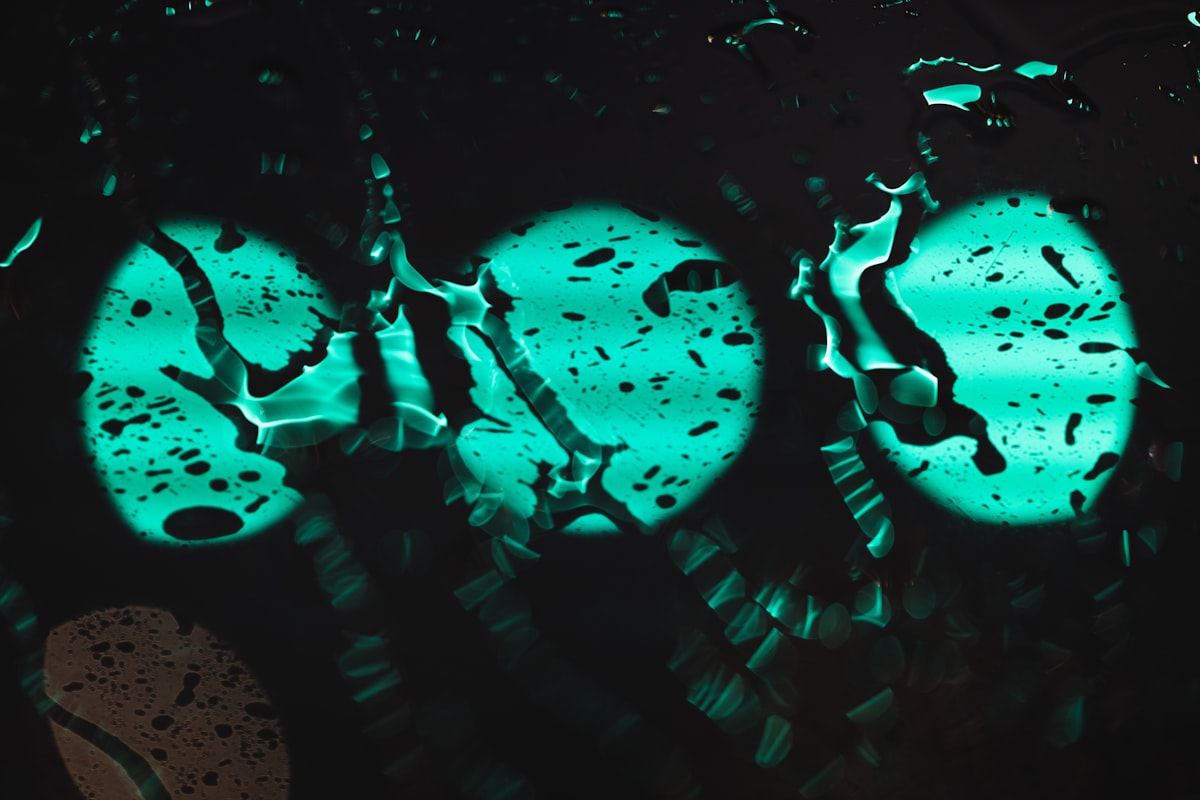 a close up of a traffic light in the rain related to Illuminate Your Nights: The Allure of Glow in the Dark Bedding