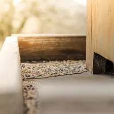 a close up of a wooden door frame related to The Complete Guide to Raised Bed Construction