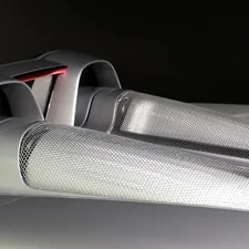 a close up of the front of a sports car related to Unleash the Racer: Ultimate Twin Speedster Bed for Kids