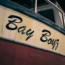 a close up of the side of a boat related to Relaxation Awaits: A Guide to Put-in-Bay Bed and Breakfast