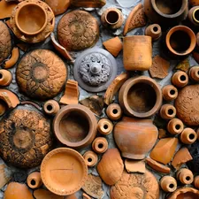 a collection of clay pots and vases on display related to Where to Buy Clay Chiminea: A Comprehensive Guide