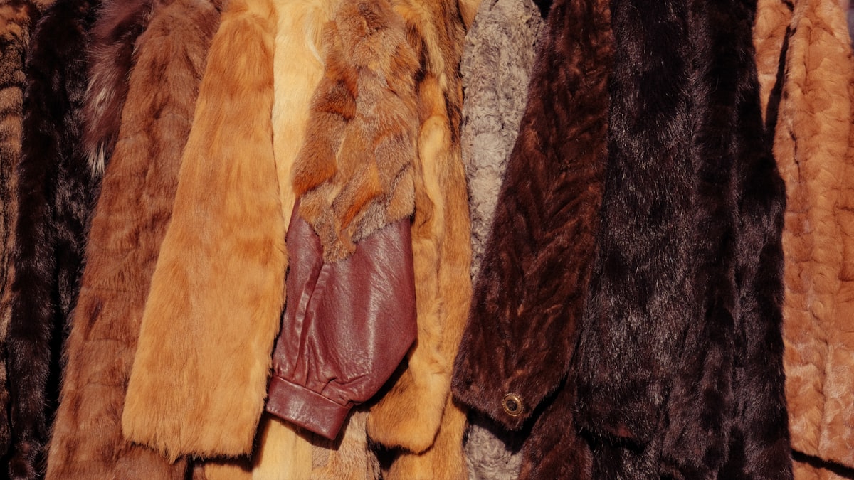 A collection of various fur coats hanging together. related to Transform Your Truck Bed with Durable Coat Liners