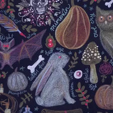 a colorful quilt with a pattern related to Santa's Little Dreamcatcher: Nightmare Before Christmas Baby Bedding