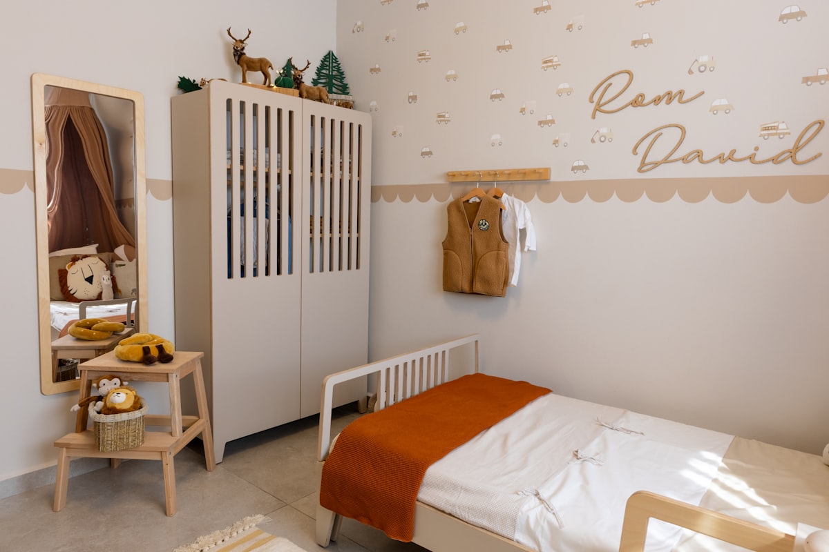 A cozy child's bedroom with a single bed. related to Creating a Royal Nursery with Purple Crib Bedding
