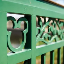 a green bench with a couple of green benches related to Adorable Bedding Ideas Featuring Beloved Disney Characters