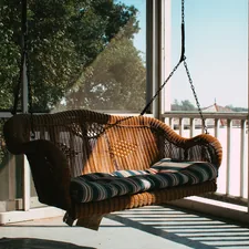 a hammock on a porch related to Relax and Recline in Luxury with a Porch Bed Swing
