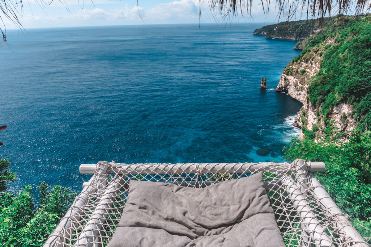 a hammock with a view of the ocean related to Transform Your Space with a Hanging Hammock Bed