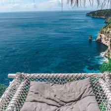 a hammock with a view of the ocean related to Transform Your Space with a Hanging Hammock Bed