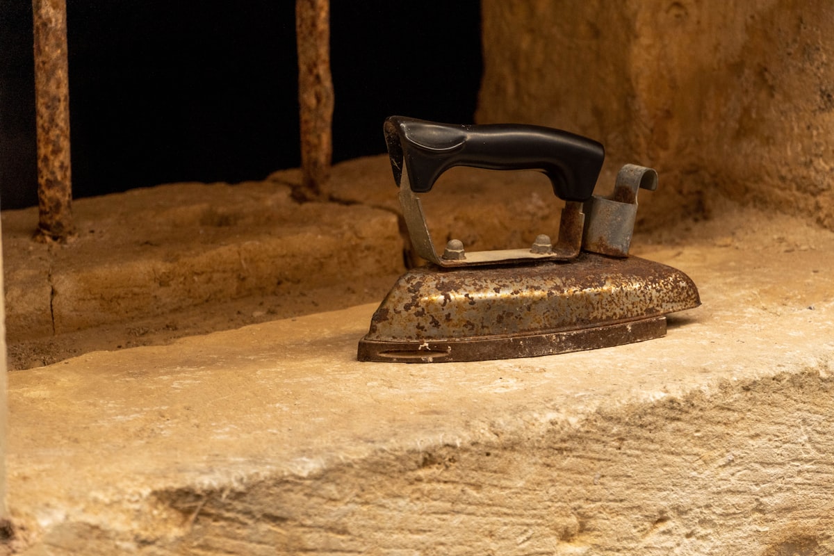 a iron sitting on top of a stone slab related to The Ultimate Guide to Choosing Bed Bath & Beyond Irons: What You Need to Know