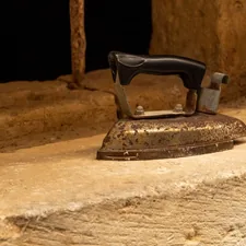 a iron sitting on top of a stone slab related to The Ultimate Guide to Choosing Bed Bath & Beyond Irons: What You Need to Know