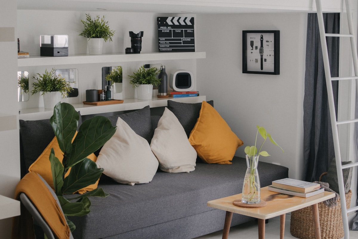 a living room filled with furniture and a ladder related to Transform Your Space with These Small Entryway Decorating Ideas