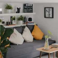 a living room filled with furniture and a ladder related to Transform Your Space with These Small Entryway Decorating Ideas
