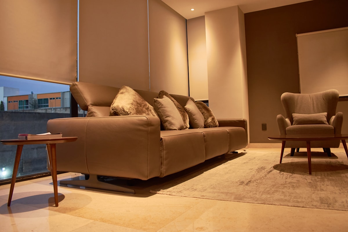 a living room filled with furniture and a large window related to Transform Your Space: The Ultimate Sofa Bed Chaise Guide