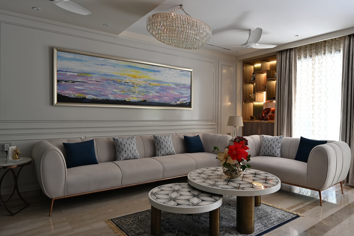 a living room filled with furniture and a painting on the wall related to Living Room Valances
