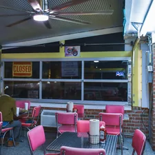 a man sitting at a table in a restaurant related to Discover the Charm of Bed and Breakfasts in Chattanooga