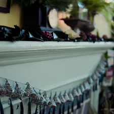 a mantle with a bunch of items on top of it related to Homemade Valance Ideas
