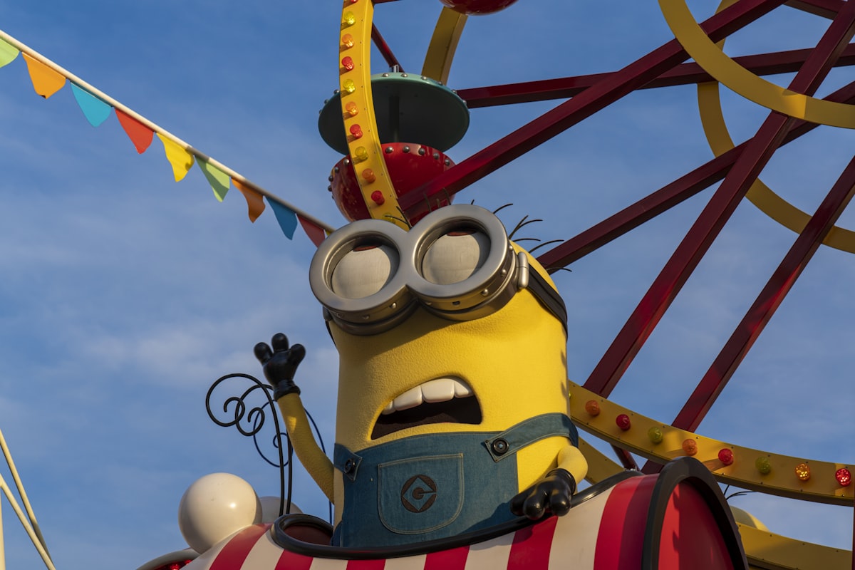 a minion rides a carnival ride at a carnival related to Get Ready to Despicable-ize Your Bedroom with Minion Bed Set