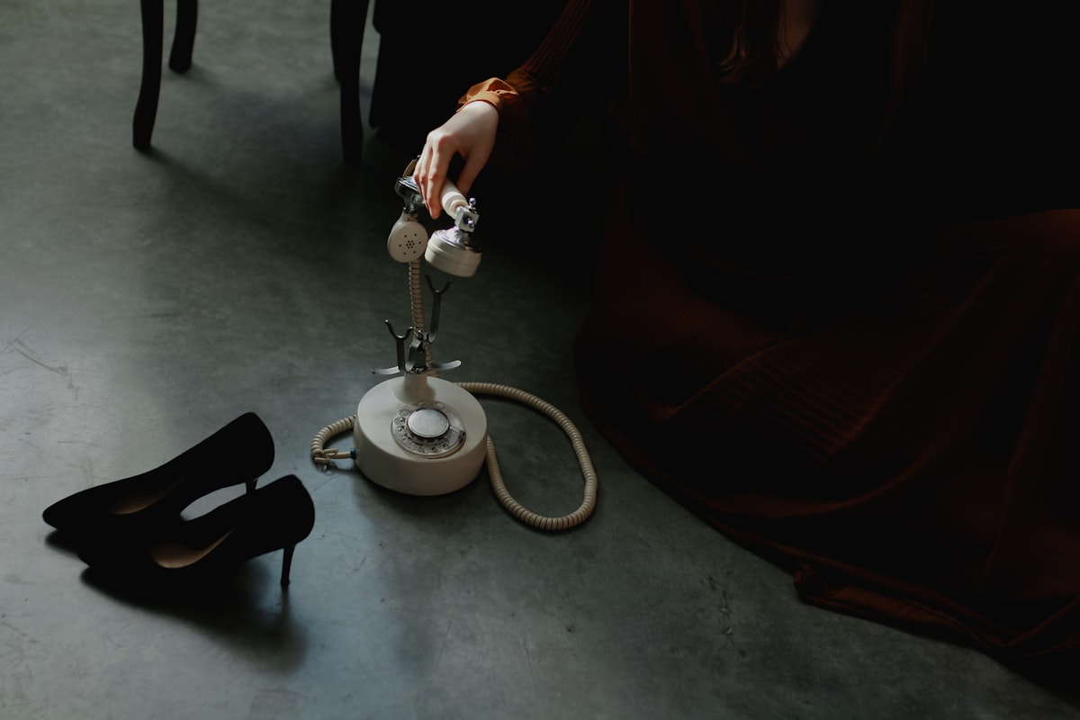 a pair of black high heeled shoes sitting on the floor related to Revitalize Your Wardrobe: The Ultimate Guide to Clothes Steamers from Bed Bath & Beyond