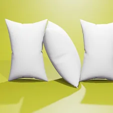 a pair of white pillows sitting on top of a green floor related to The Comforting Bliss of Home: Bed Lounge Pillows Explained