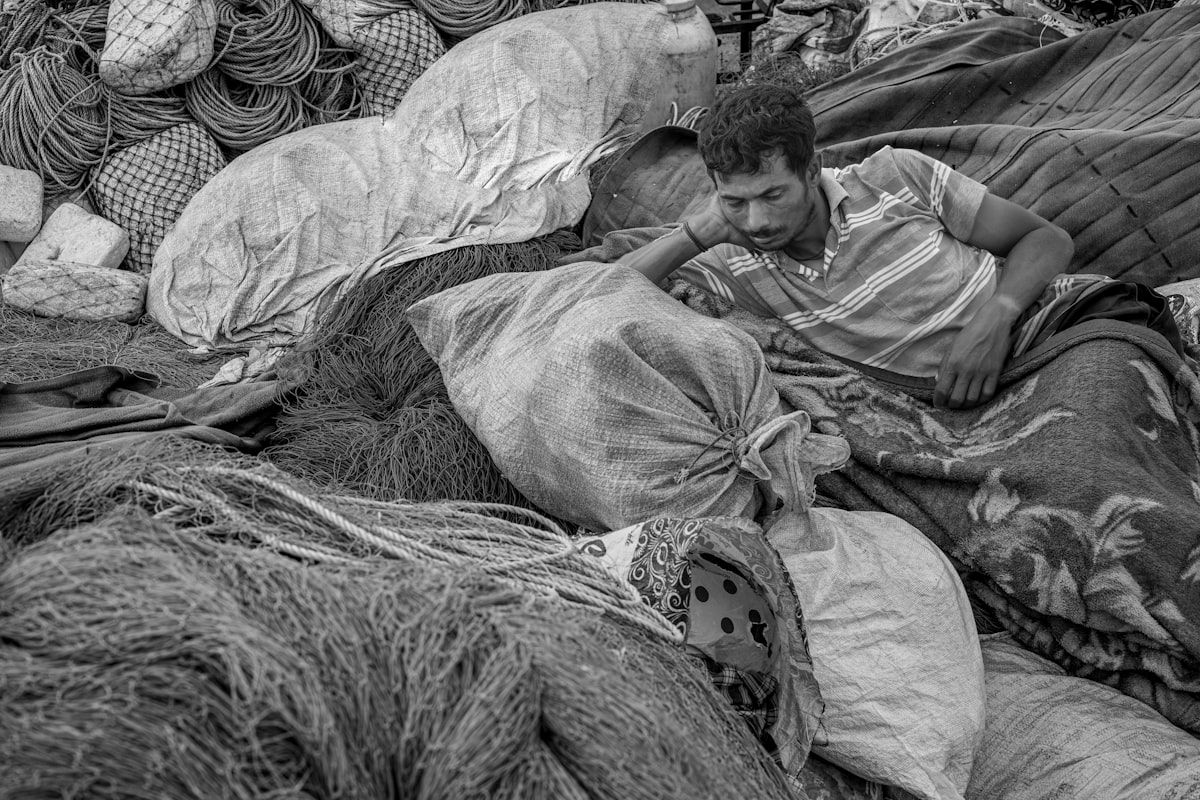 a person laying on a bed related to Revolutionize Your Sleep with Cheap Bed in a Bag Deals