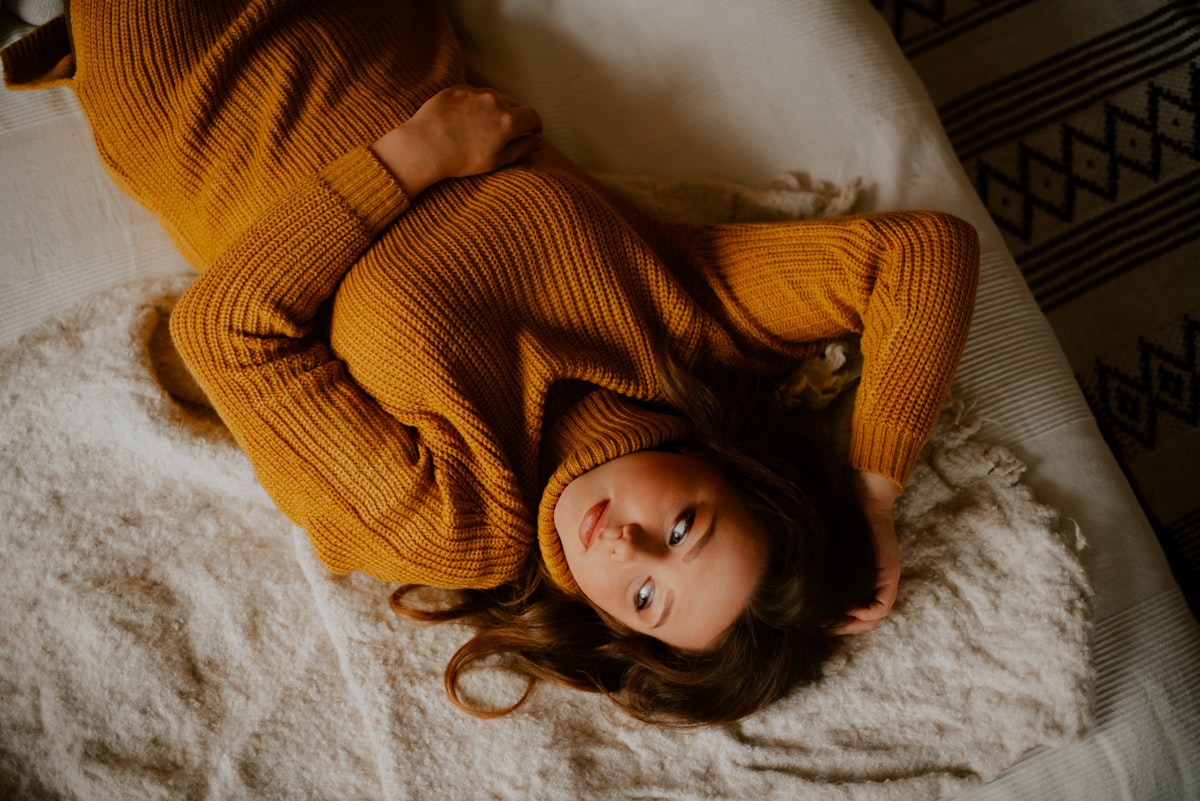 a person lying on a bed related to Cozy Dreams for Little Ones